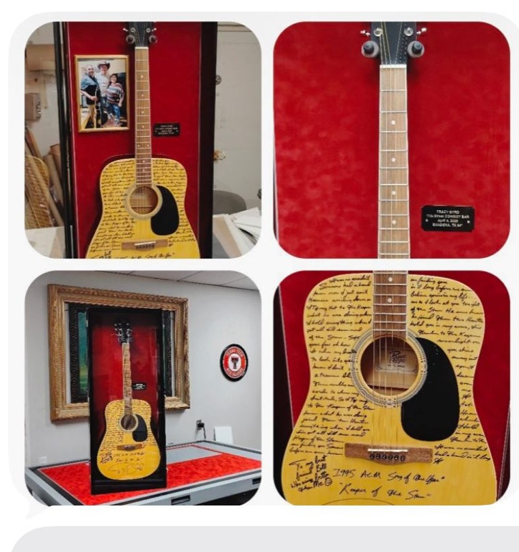 A signed Tracy Byrd guitar mounted in a deep red-lined display case, shown from four angles